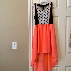 Pink and black polkadot dress.
